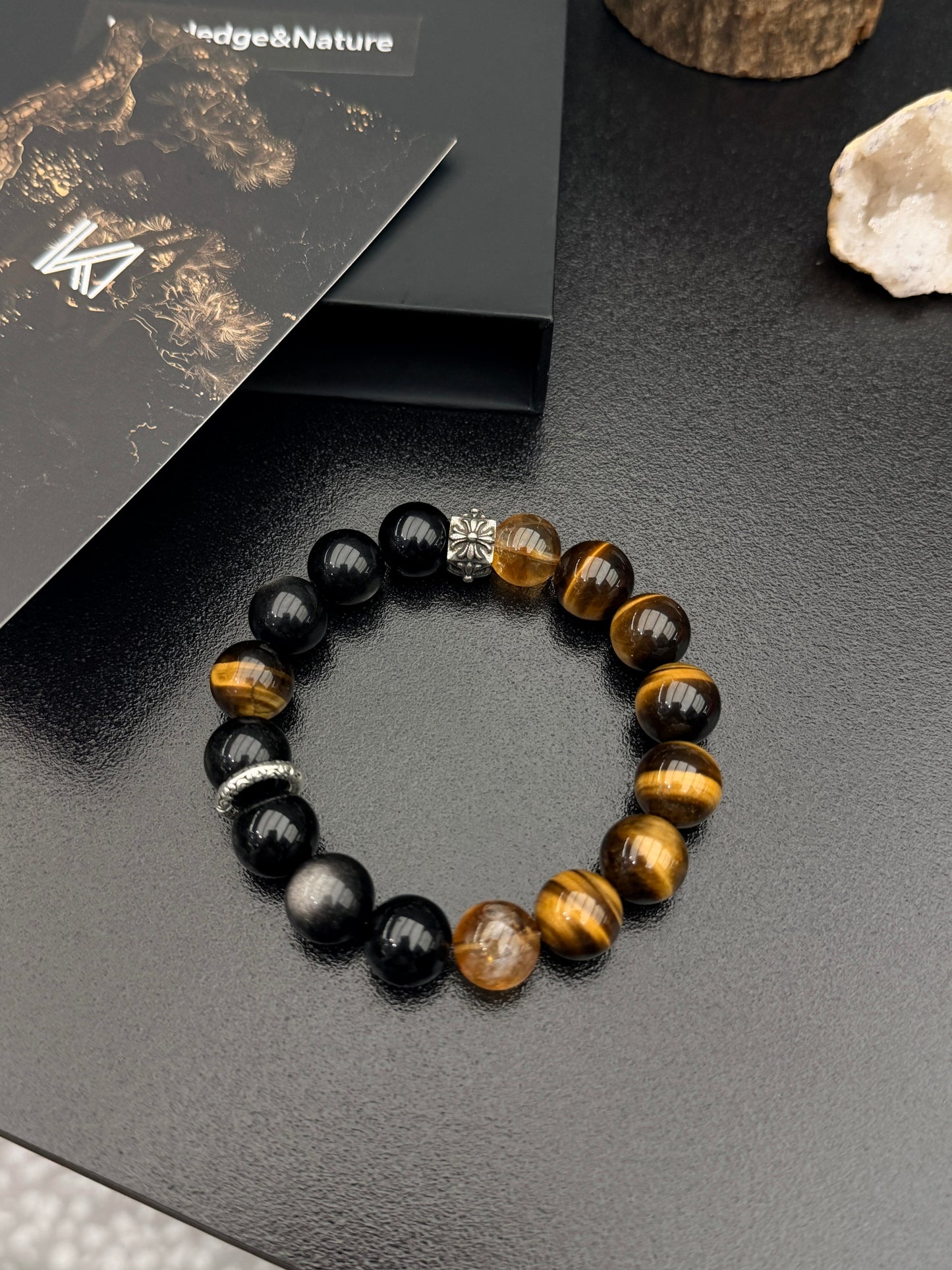 Tiger Eye and Black Obsidian bracelet on gift card flat lay