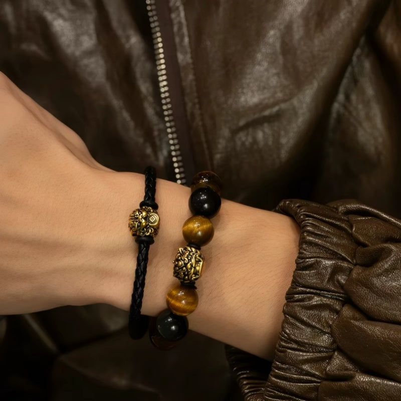 Tiger Eye and Black Onyx bracelet close-up on hand
