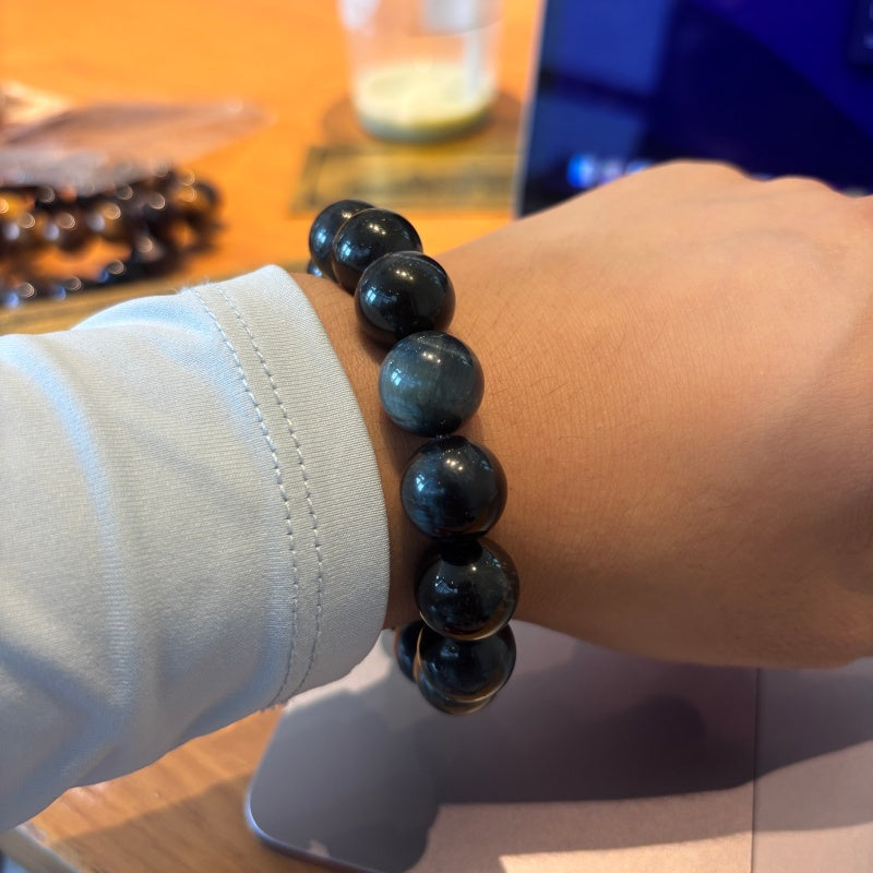 14mm Blue Tiger Eye bracelet worn on wrist