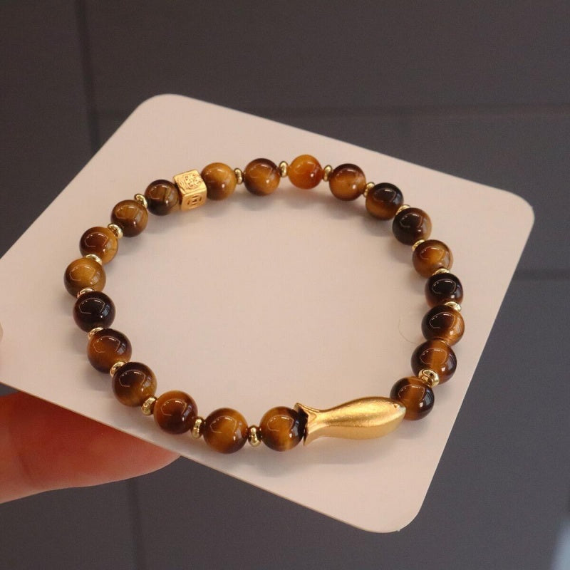 Tiger Eye Gold Fish Bracelet worn on wrist