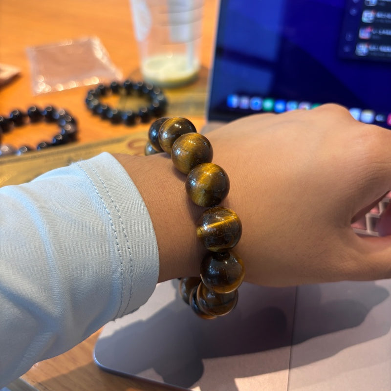 16mm Tiger Eye bracelet worn on wrist