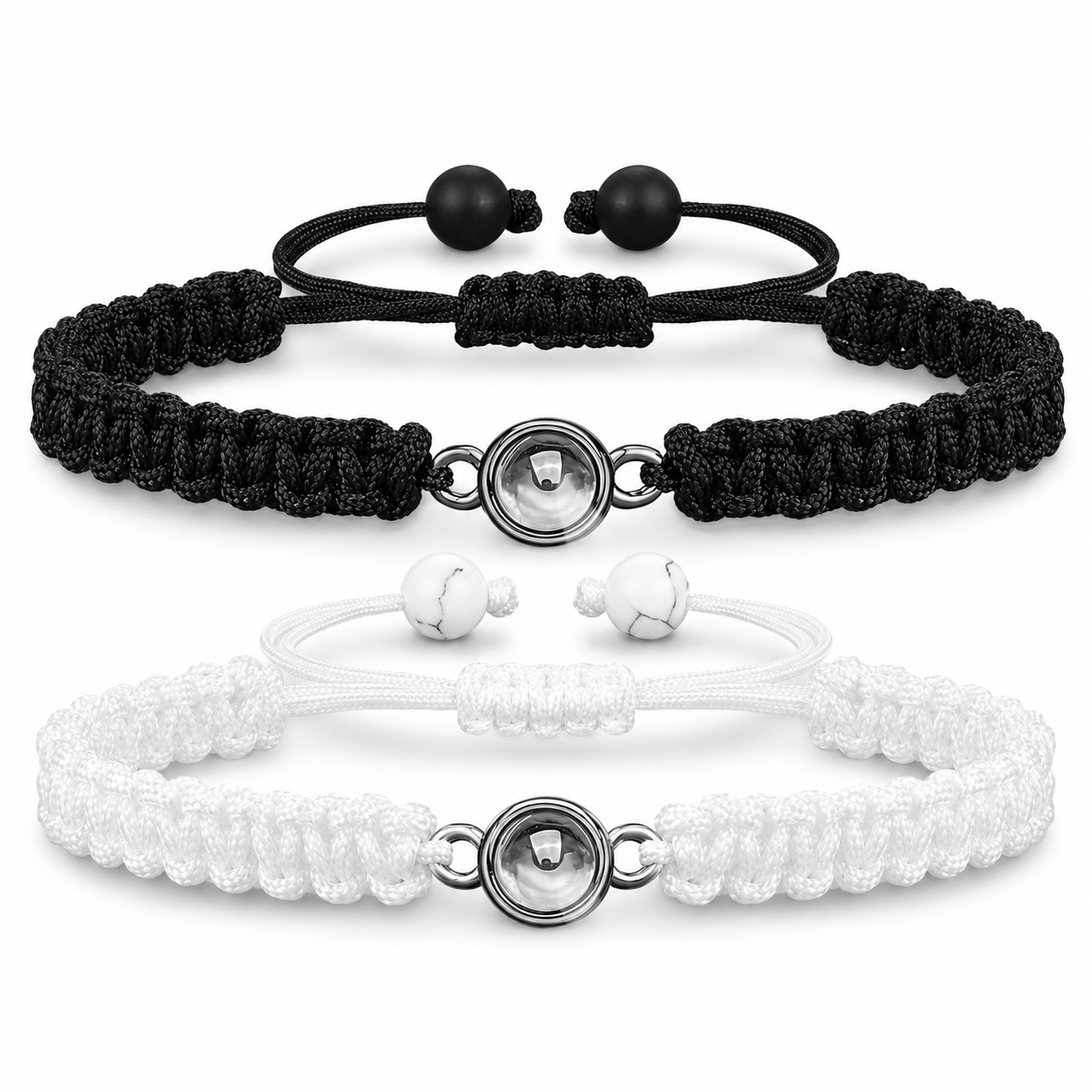 Black and white adjustable projection bracelets showing the central silver charm with I Love You in 100 languages